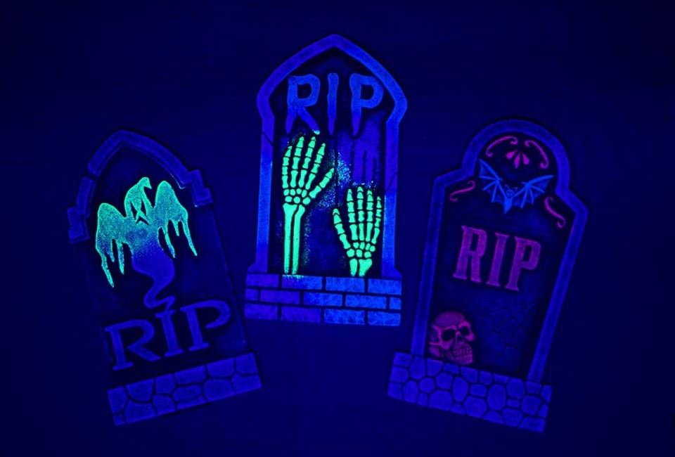 Black Light Reactive Tombstones for outdoor black light halloween decorations.